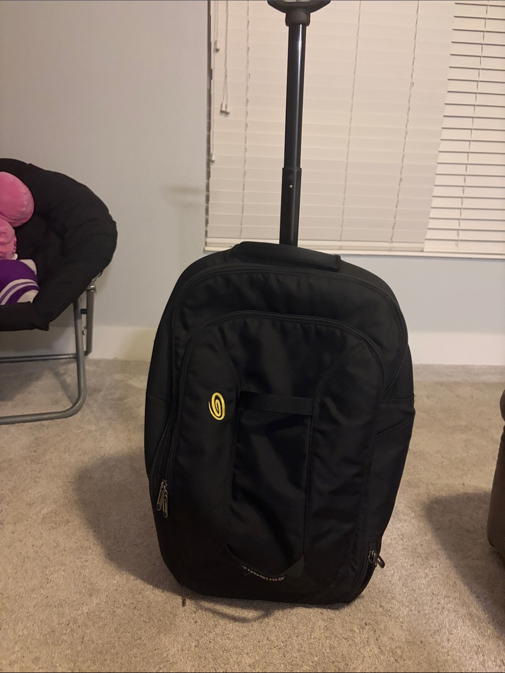 Timbuk2 Black Rolling carryon suitcase with Yellow Accent